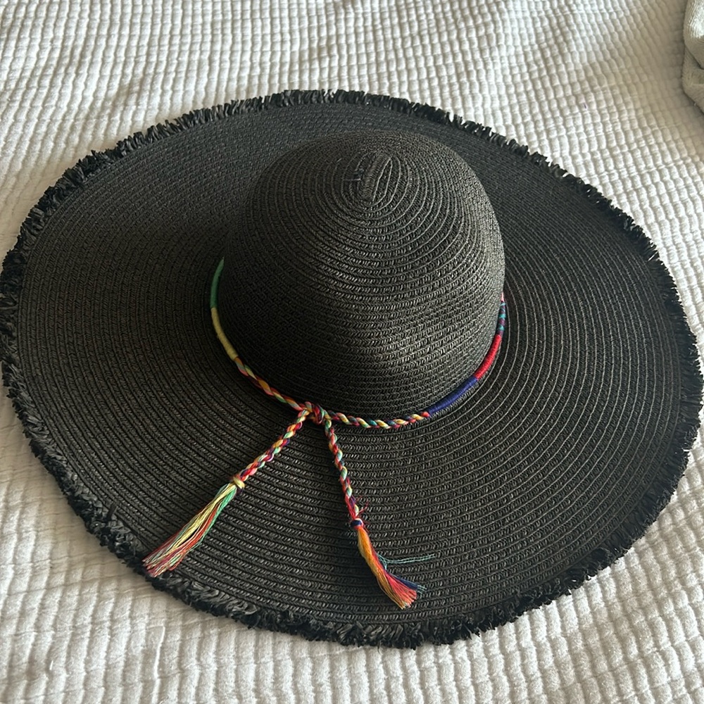 Basically brand new black straw hat